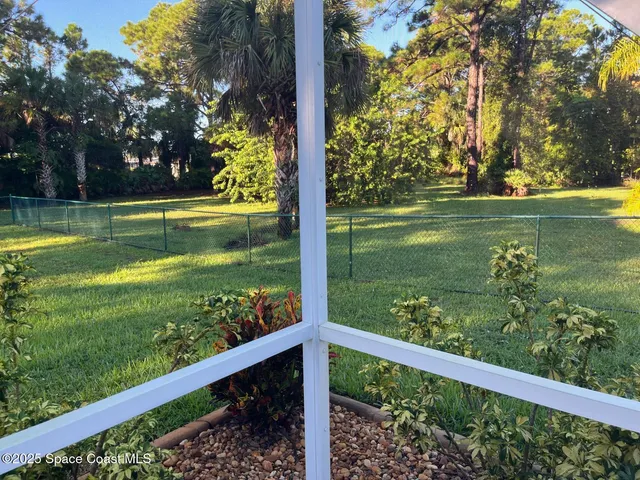 a view of a lake from a yard