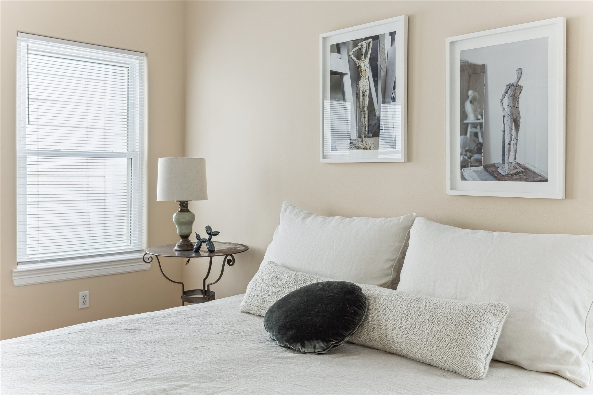 3515 Yupon Street Houston, TX 77006 - Photo 19 of 41 a bedroom with a bed and wooden floor