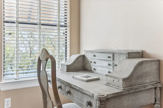 a bathroom with a tub and a shower