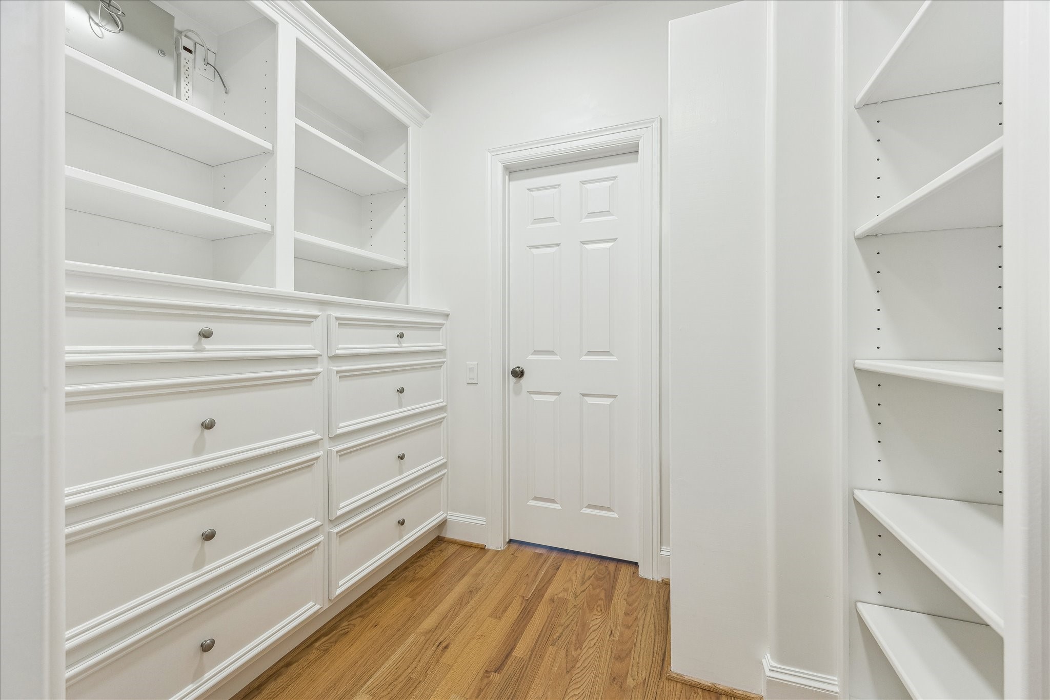 3515 Yupon Street Houston, TX 77006 - Photo 27 of 41 a view of an empty walk in closet