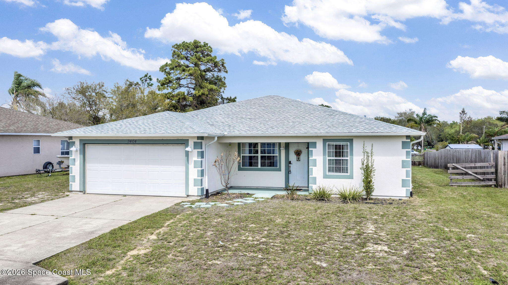 3404 Kilbee Street Mims, FL 32754 - Photo 1 of 30 a front view of house with yard