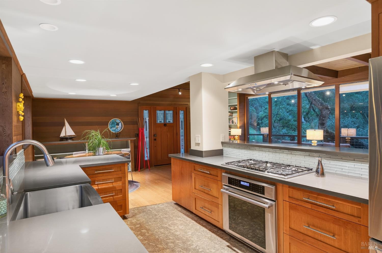 116 Hill Road Glen Ellen, CA 95442 - Photo 11 of 48 Sleek kitchen with quartz counters, stainless steel appliances, cork floors.