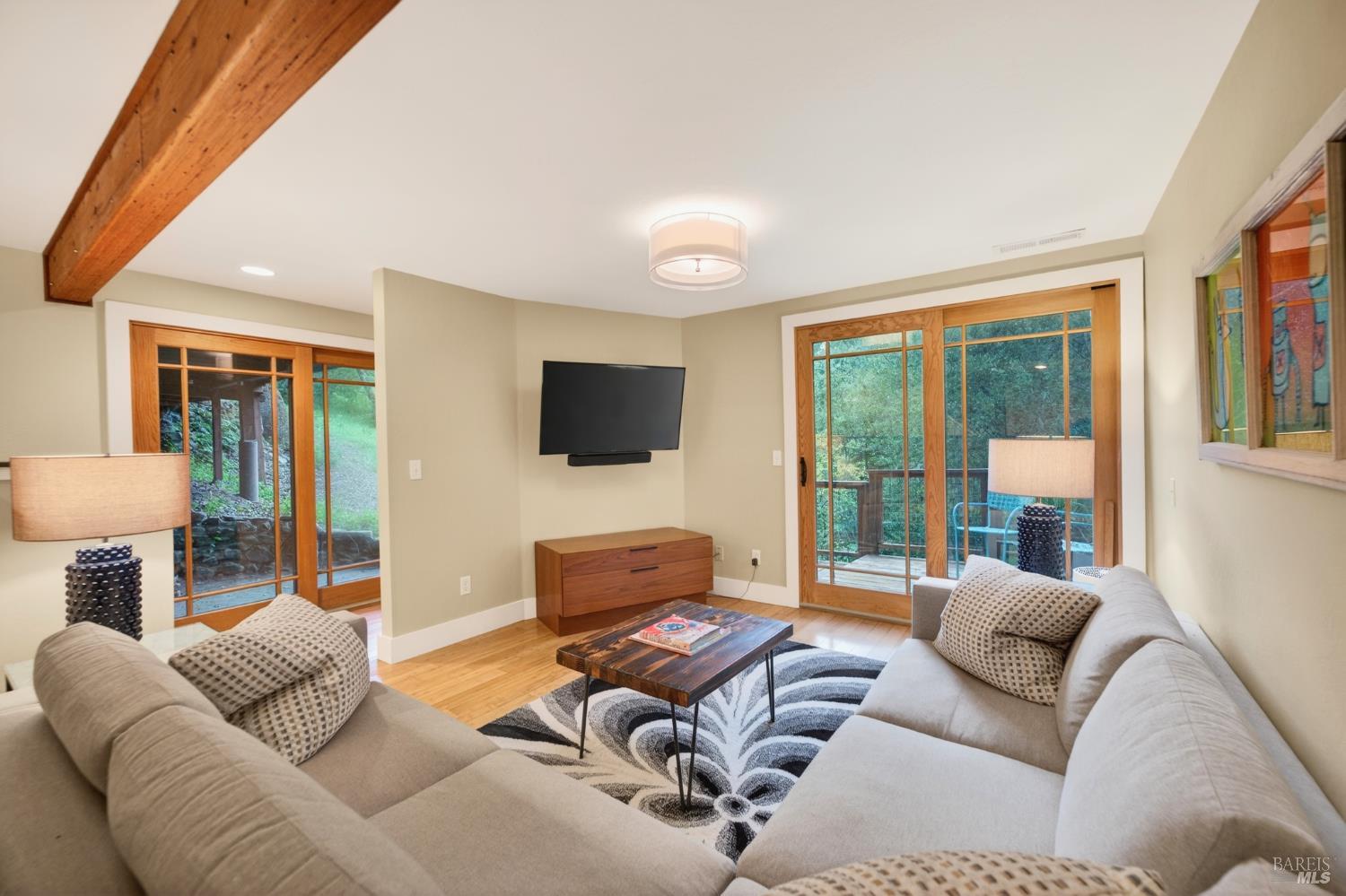 116 Hill Road Glen Ellen, CA 95442 - Photo 22 of 48 Sitting area of bedroom with two accesses to the outdoors.