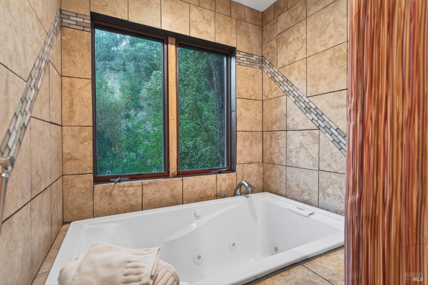 116 Hill Road Glen Ellen, CA 95442 - Photo 31 of 48 Spa has private view to the outdoors.