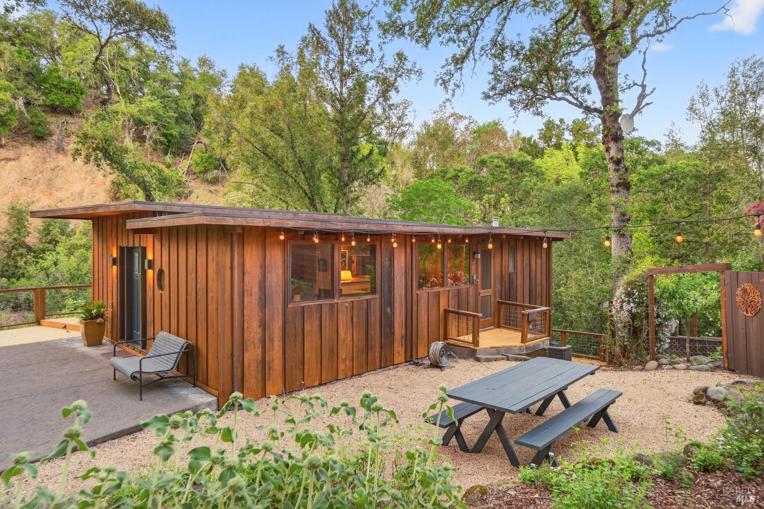 116 Hill Road Glen Ellen, CA 95442 - Photo 34 of 48 Dining area off kitchen. Below house at right is a hidden deck.