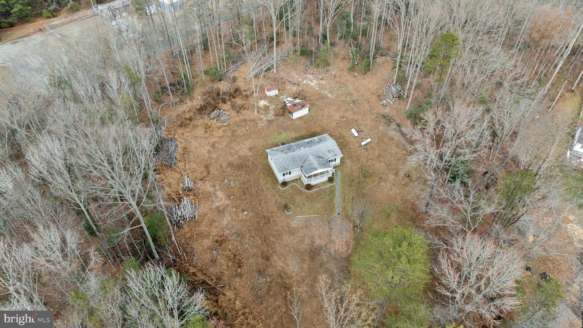 9523 Brock Road Spotsylvania, VA 22553 - Photo 41 of 44 a aerial view of a house with a yard