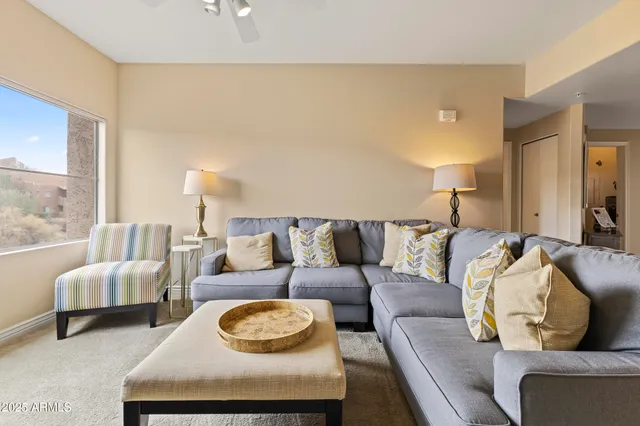 a living room with furniture and a couch