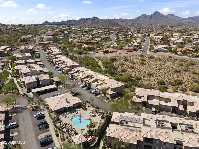 an aerial view of a city with lots of residential buildings