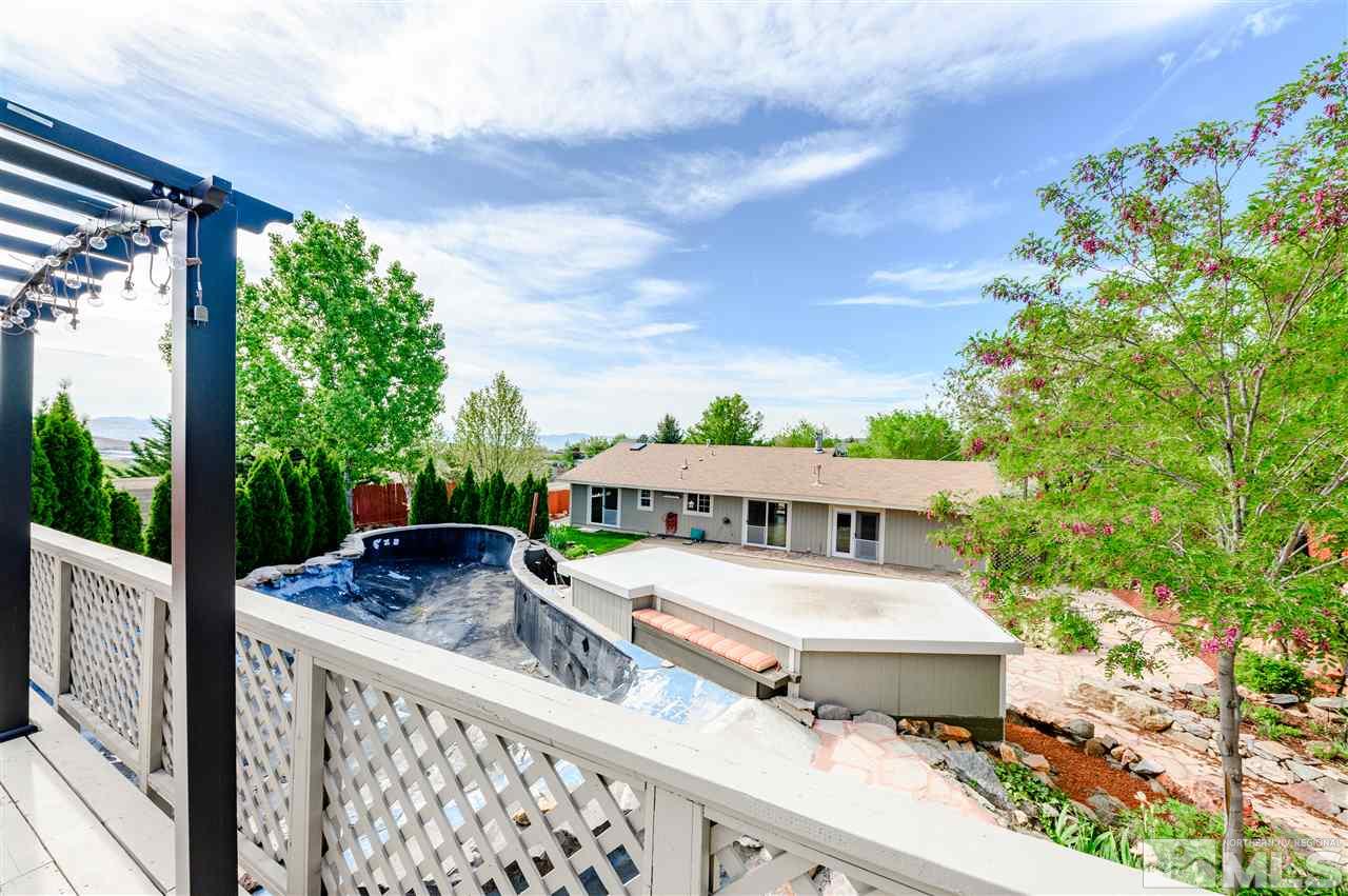 301 Hoge Road Reno, NV 89506 - Photo 18 of 23 a view of a chairs and table in the balcony
