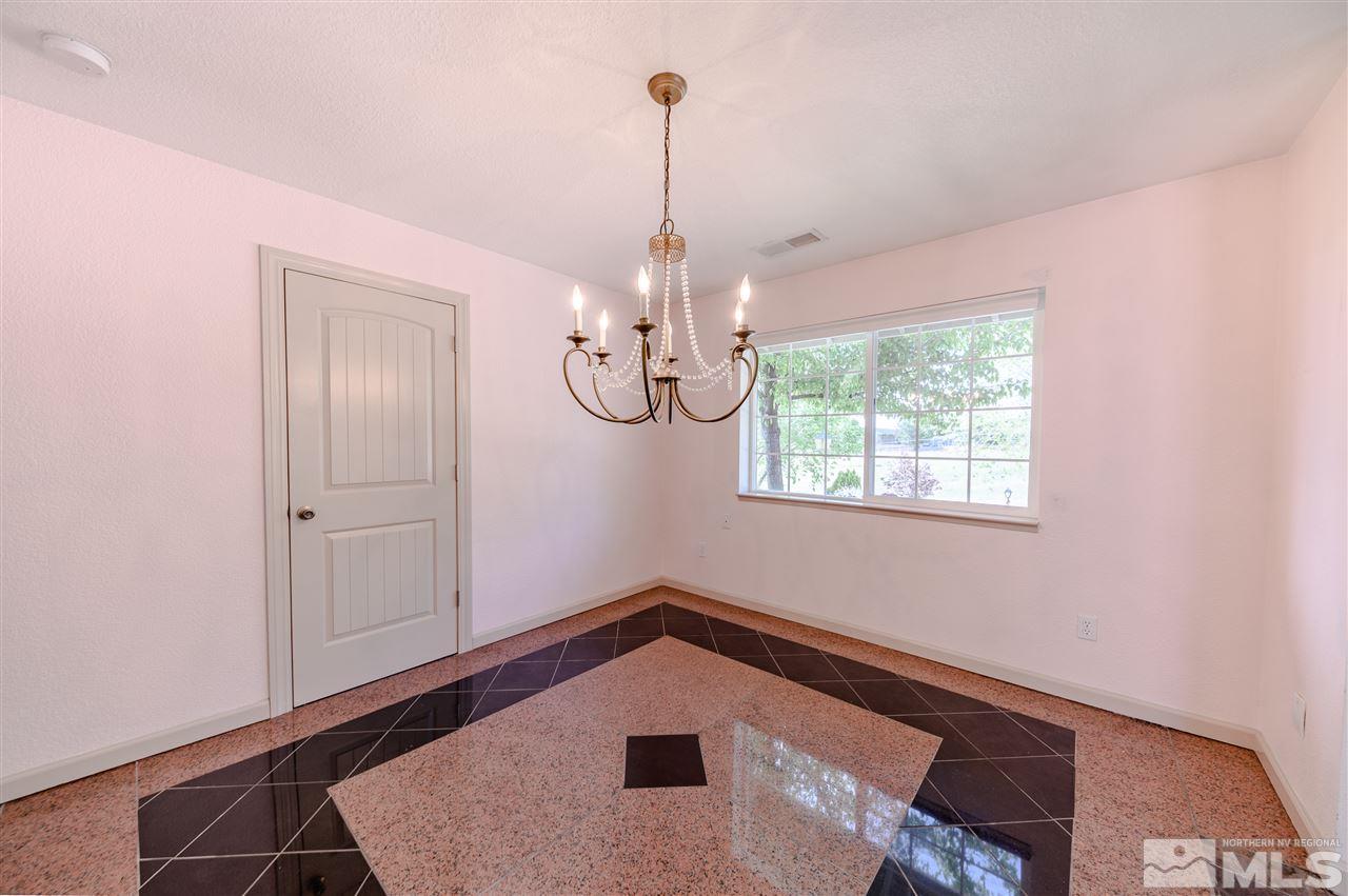 301 Hoge Road Reno, NV 89506 - Photo 5 of 23 a view of a room with window and ceiling fan