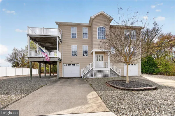 a front view of a house with entertaining space