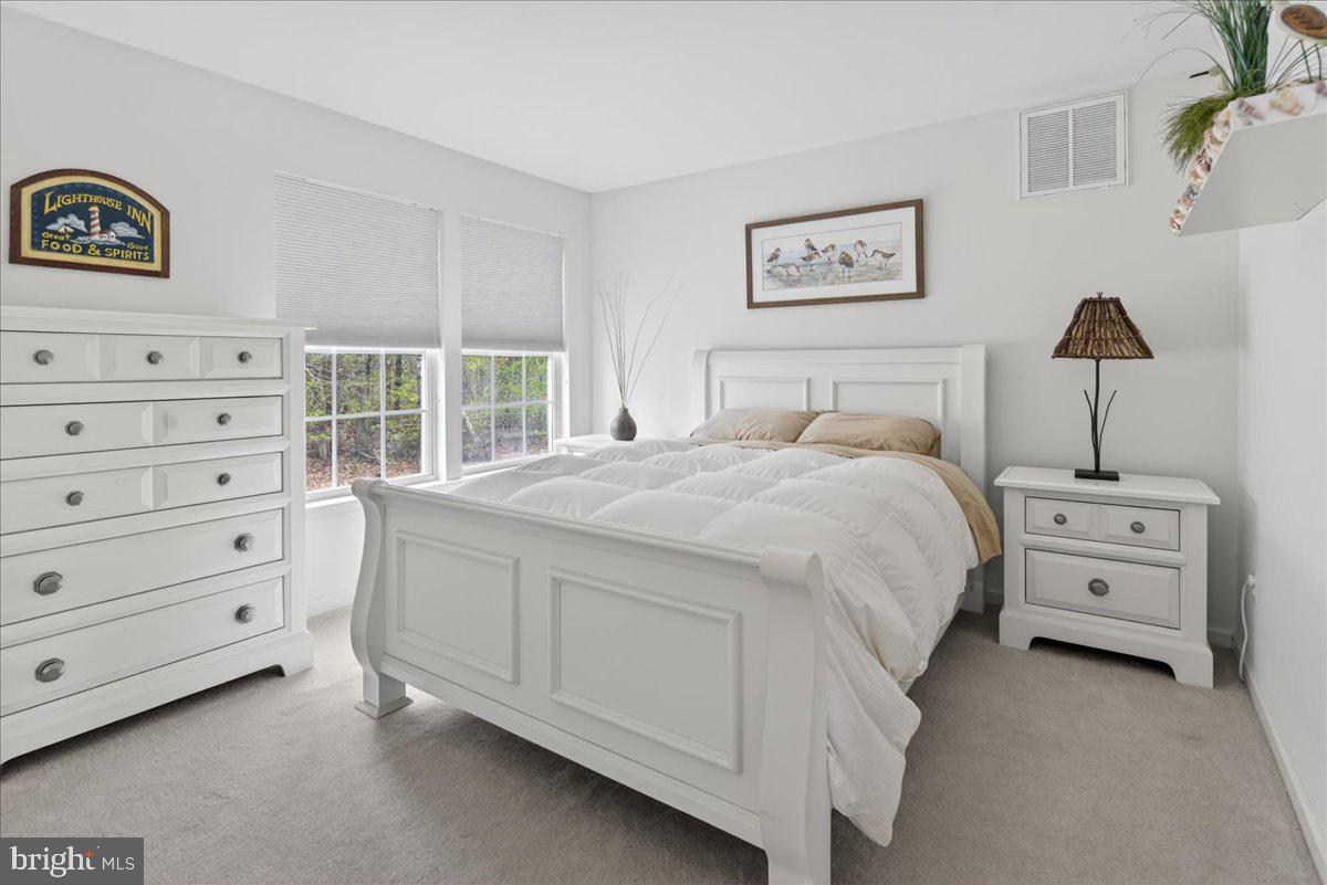 116 Marine Road Waretown, NJ 08758 - Photo 12 of 67 a bedroom with a bed and a window