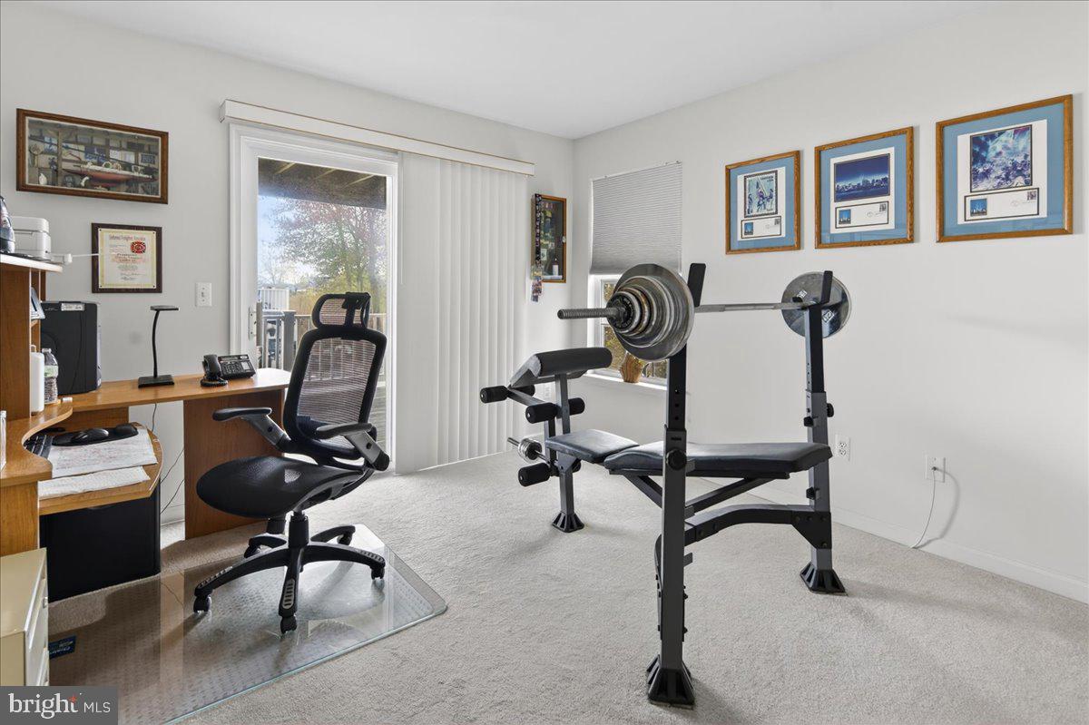 116 Marine Road Waretown, NJ 08758 - Photo 14 of 67 a view of a workspace with gym equipment