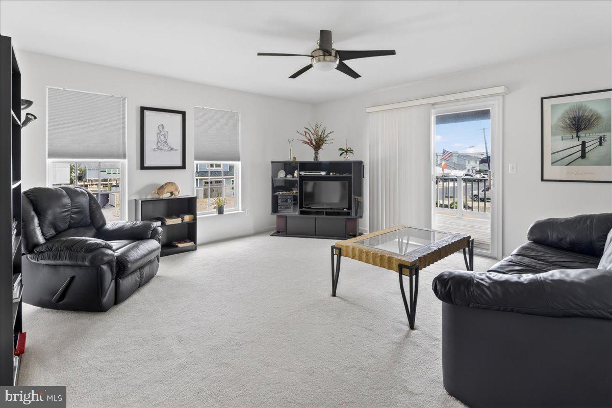 116 Marine Road Waretown, NJ 08758 - Photo 15 of 67 a living room with furniture and a flat screen tv