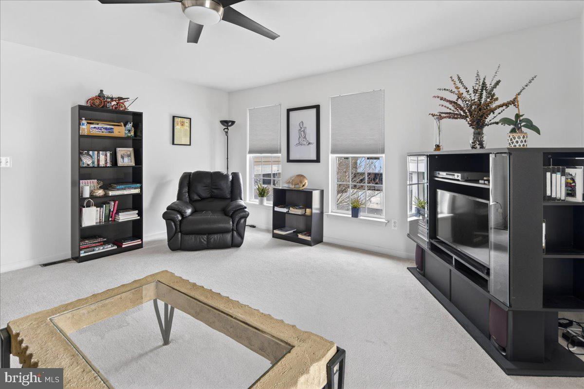 116 Marine Road Waretown, NJ 08758 - Photo 16 of 67 a living room with furniture and a flat screen tv