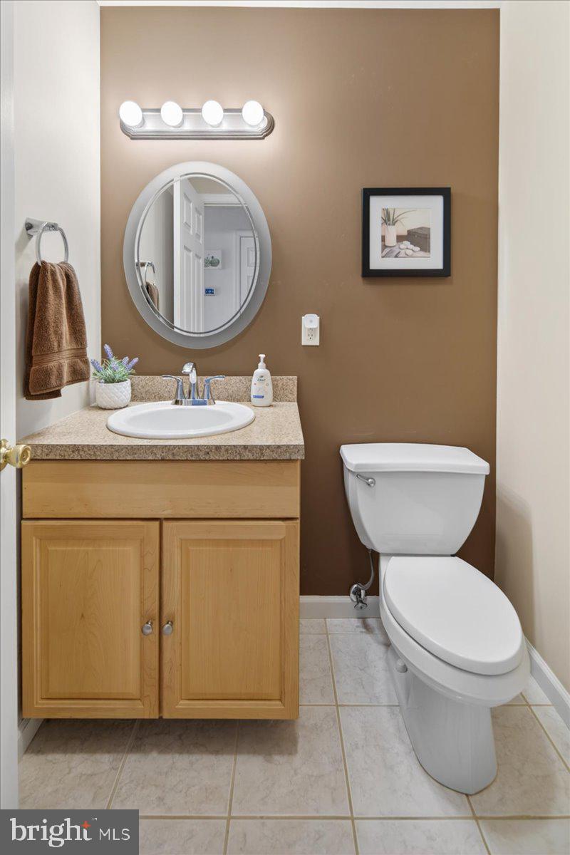 116 Marine Road Waretown, NJ 08758 - Photo 20 of 67 a bathroom with a toilet a sink and a mirror