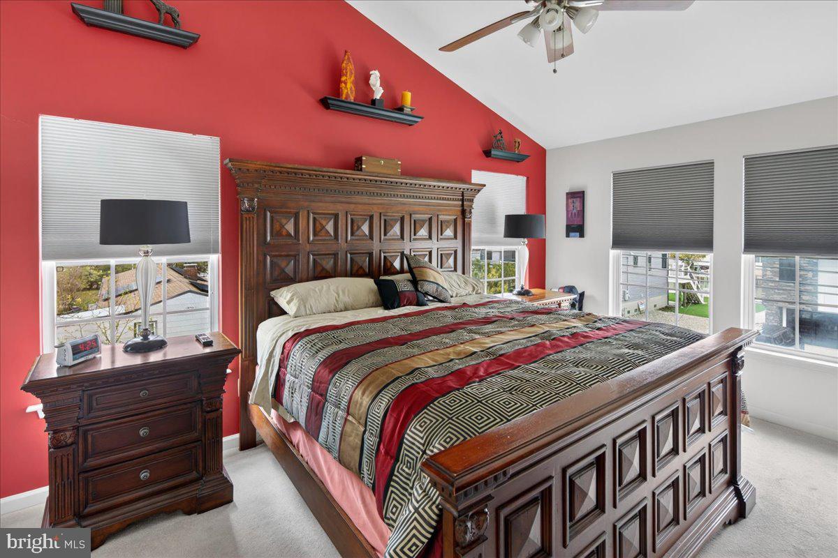 116 Marine Road Waretown, NJ 08758 - Photo 21 of 67 a bedroom with a bed and a flat screen tv