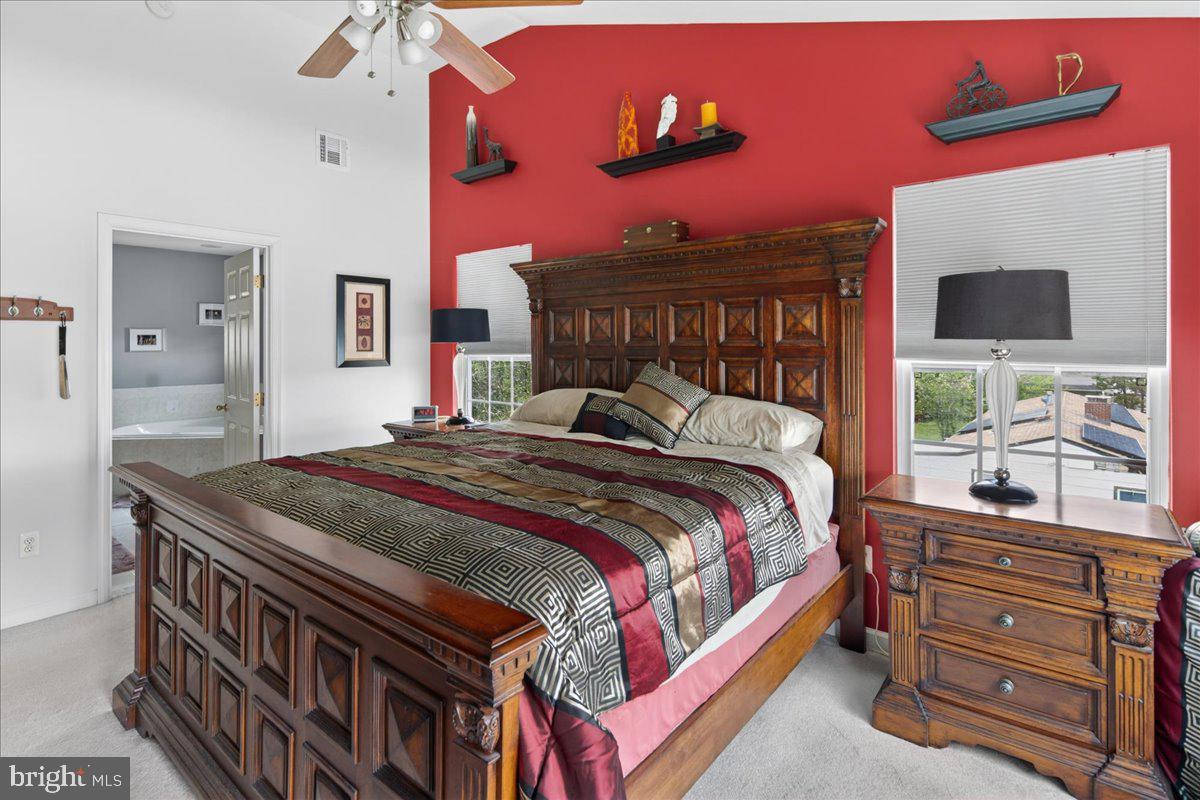 116 Marine Road Waretown, NJ 08758 - Photo 23 of 67 a bed sitting in a bedroom and a flat screen tv