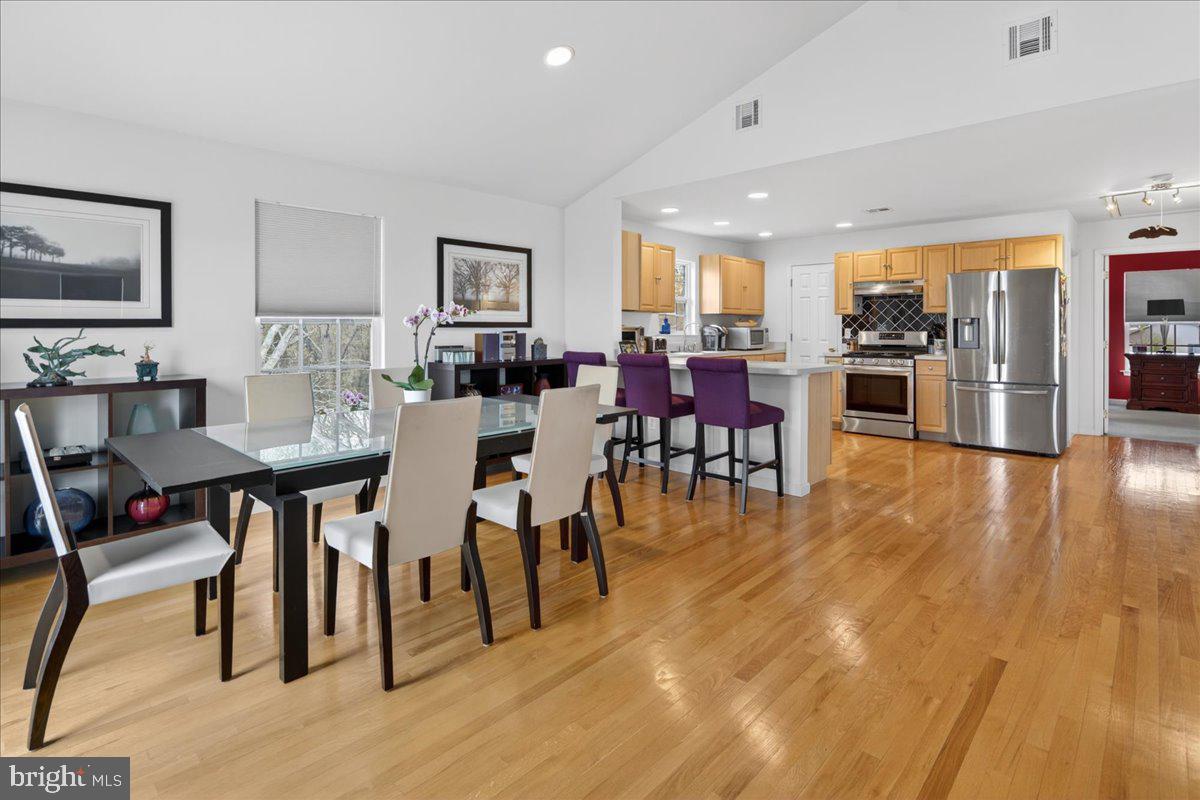 116 Marine Road Waretown, NJ 08758 - Photo 29 of 67 a view of a dining room with furniture and wooden floor