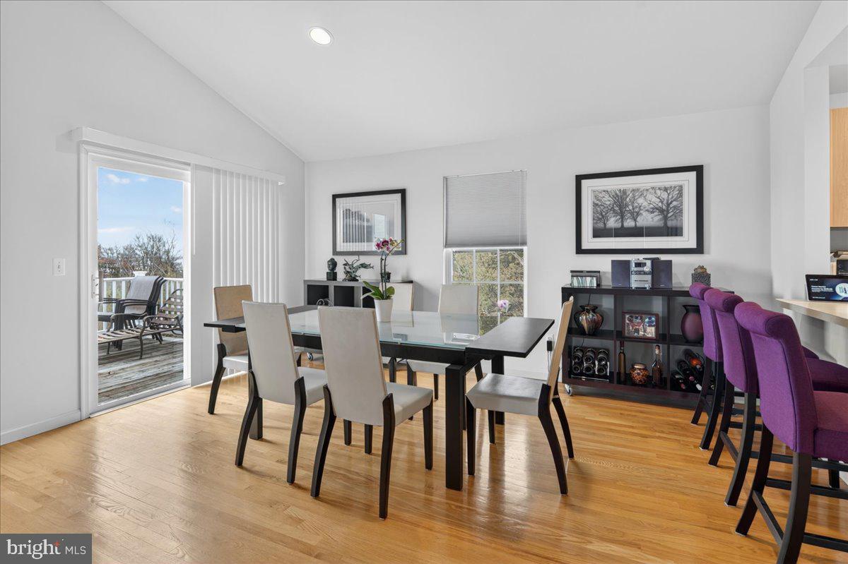 116 Marine Road Waretown, NJ 08758 - Photo 30 of 67 a view of a dining room with furniture and wooden floor