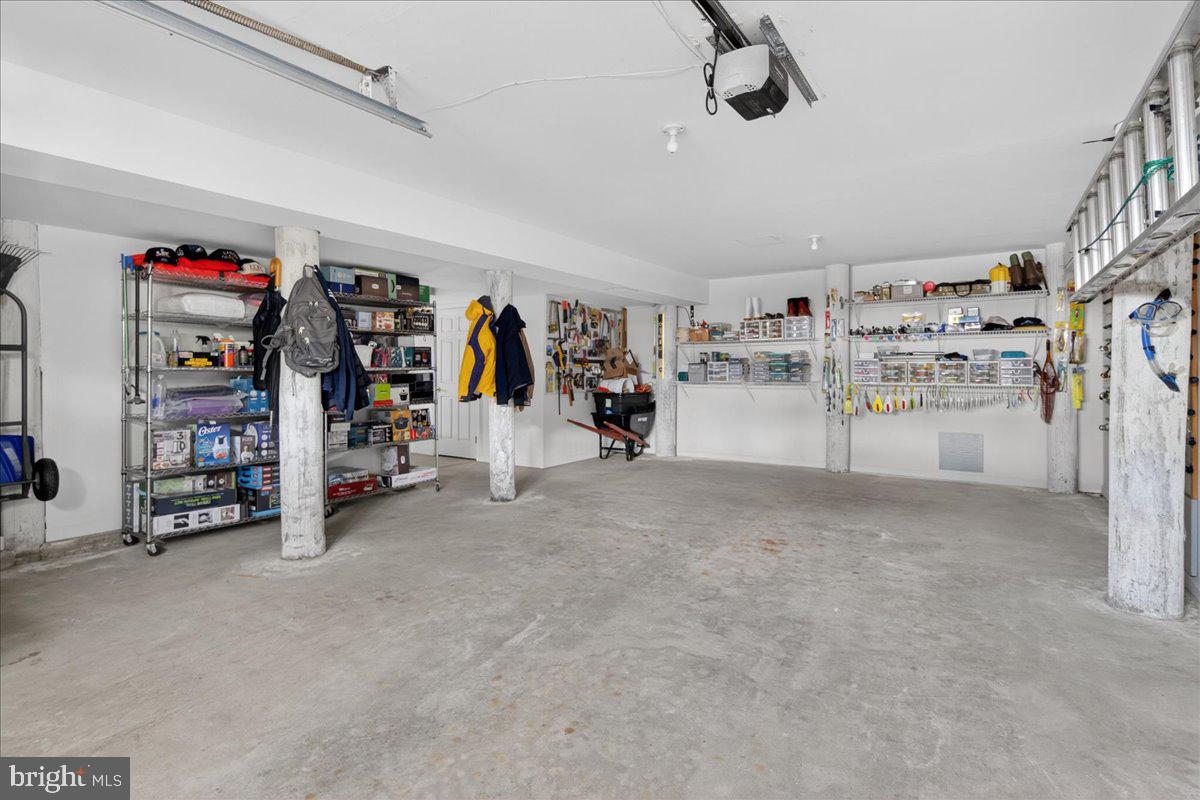 116 Marine Road Waretown, NJ 08758 - Photo 3 of 67 a view of a garage with storage