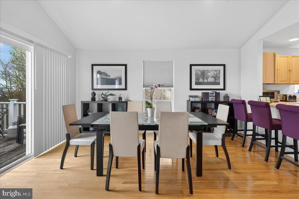 116 Marine Road Waretown, NJ 08758 - Photo 31 of 67 a view of a dining room with furniture and wooden floor
