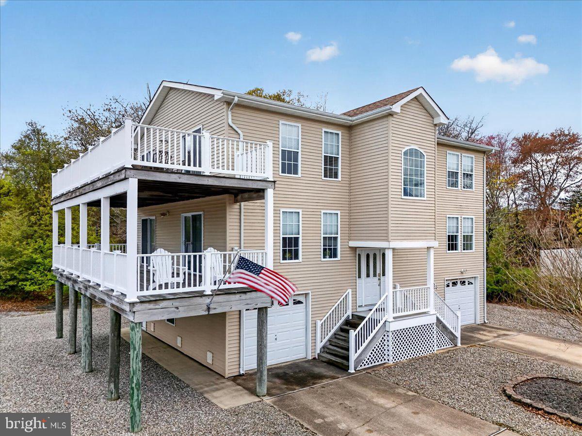 116 Marine Road Waretown, NJ 08758 - Photo 41 of 67 a front view of a house with a porch