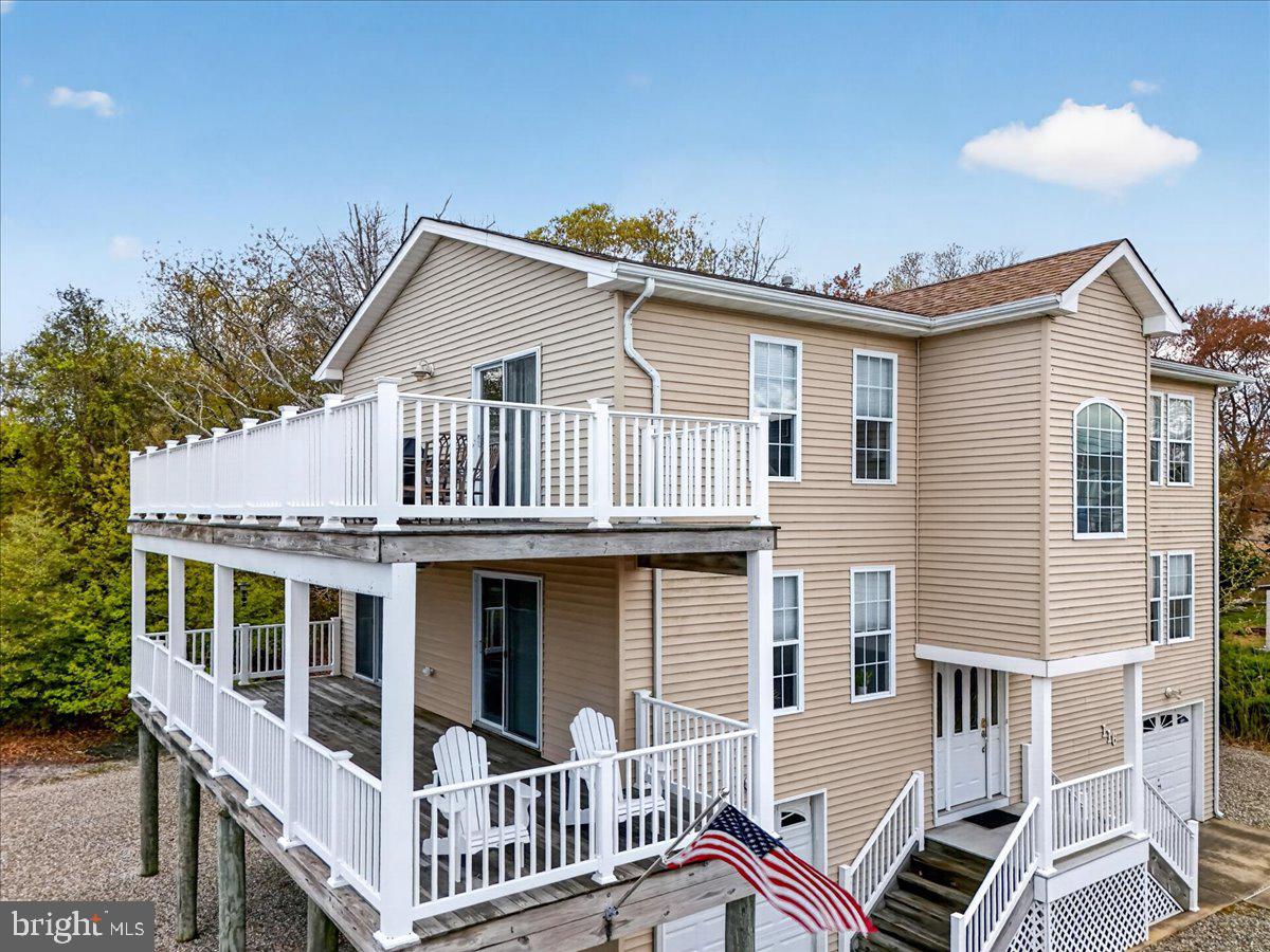 116 Marine Road Waretown, NJ 08758 - Photo 42 of 67 a front view of a house with balcony