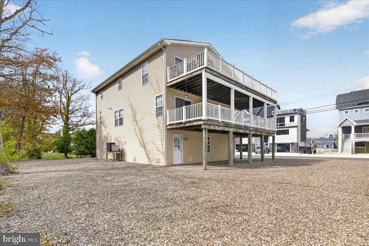 116 Marine Road Waretown, NJ 08758 - Photo 46 of 67 a front view of a house with a yard