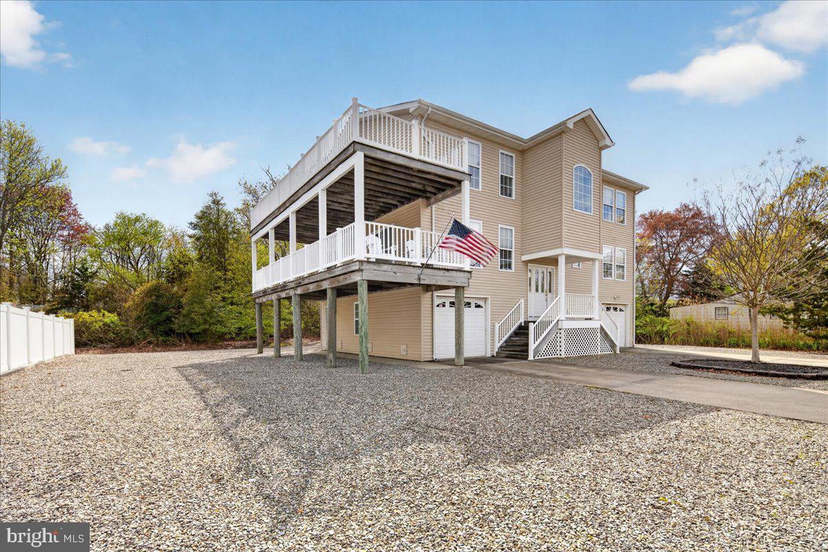 116 Marine Road Waretown, NJ 08758 - Photo 47 of 67 a front view of a house with a yard