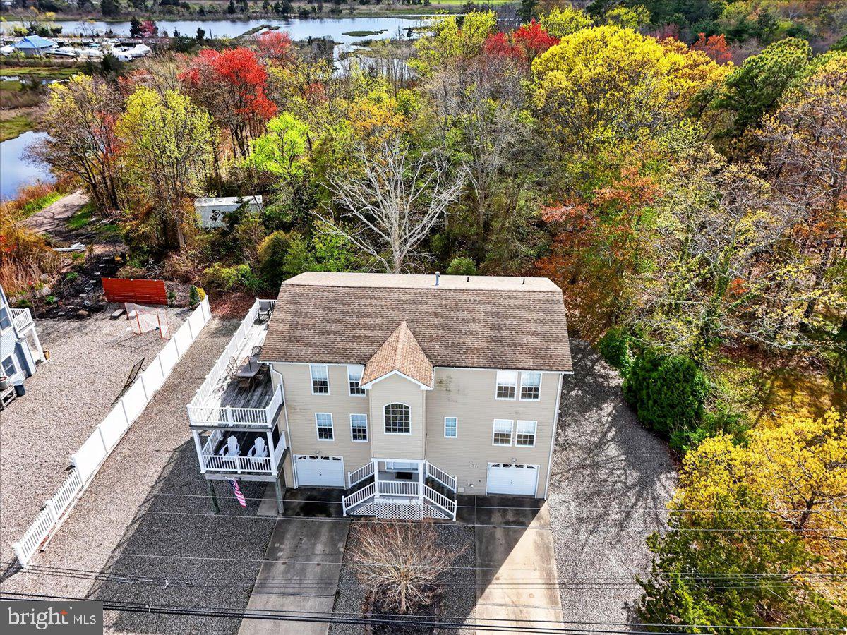 116 Marine Road Waretown, NJ 08758 - Photo 48 of 67 a aerial view of a house with large trees