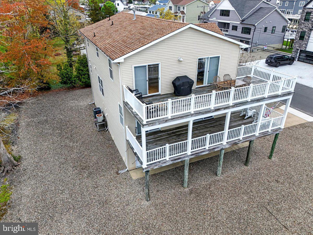 116 Marine Road Waretown, NJ 08758 - Photo 66 of 67 a view of a house with a yard and parking space