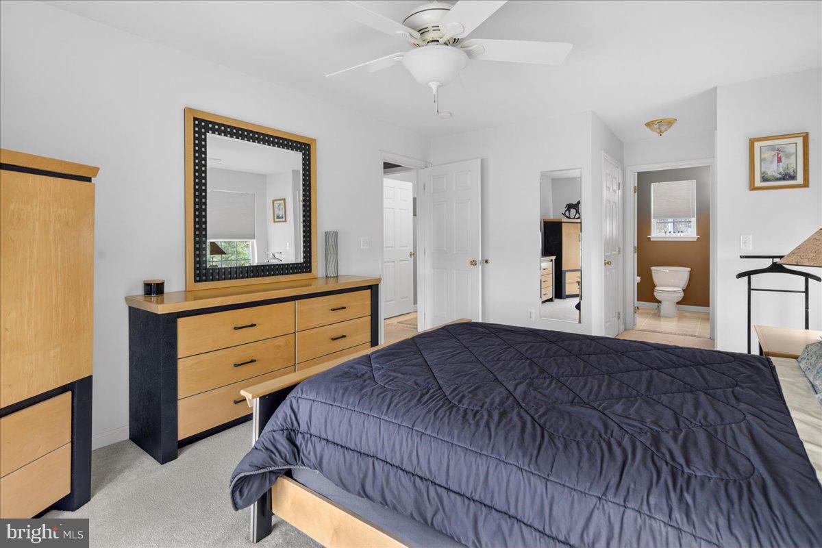116 Marine Road Waretown, NJ 08758 - Photo 9 of 67 a bedroom with a bed and a dresser
