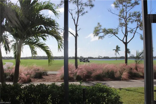 a view of a lake from a yard