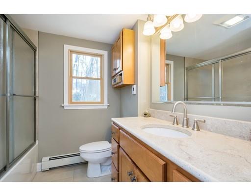 29 Swift Road Northbridge, MA 01588 - Photo 23 of 28 a bathroom with a sink a toilet and a mirror