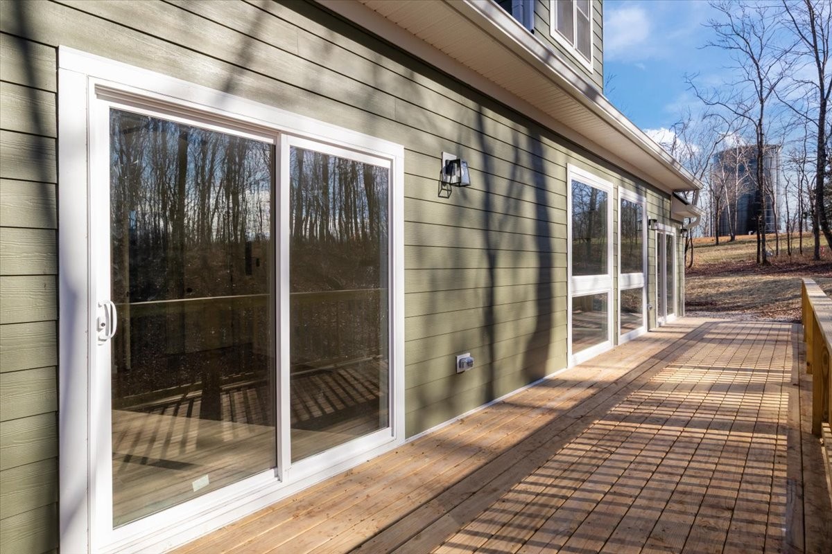 1050 Promise Land Road Charlotte, TN 37036 - Photo 25 of 29 a view of a glass door with the balcony