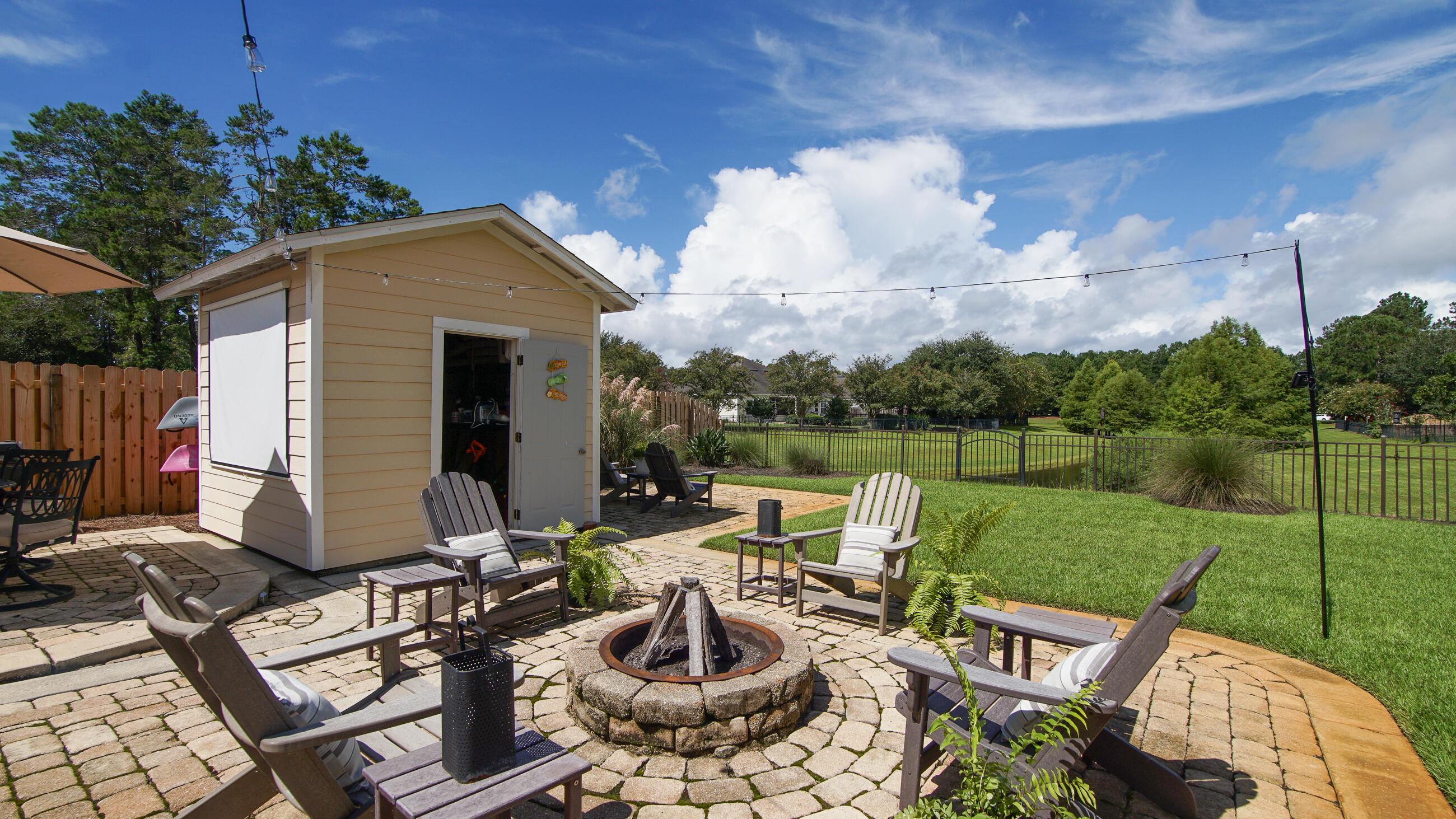 174 Mango Lane Freeport, FL 32439 - Photo 45 of 90 a view of backyard of house with seating space