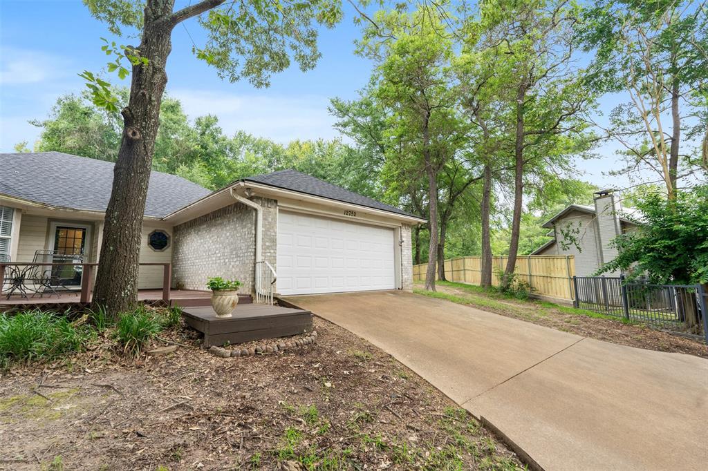 12752 Honeysuckle Circle Eustace, TX 75124 - Photo 3 of 28 Front entry garage and spacious driveway for plenty of parking.