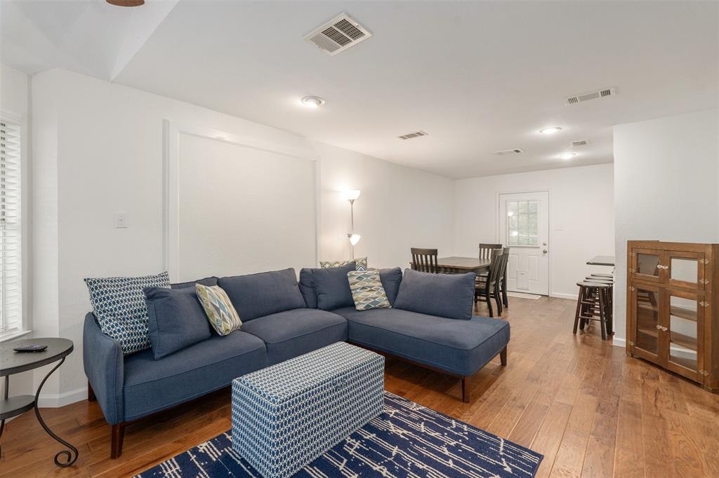 12752 Honeysuckle Circle Eustace, TX 75124 - Photo 8 of 28 Fireplace is still available behind the wall panel behind the couch.