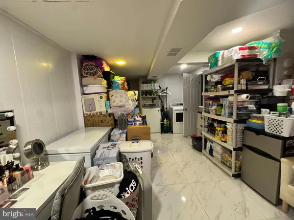 a room with furniture and a flat screen tv