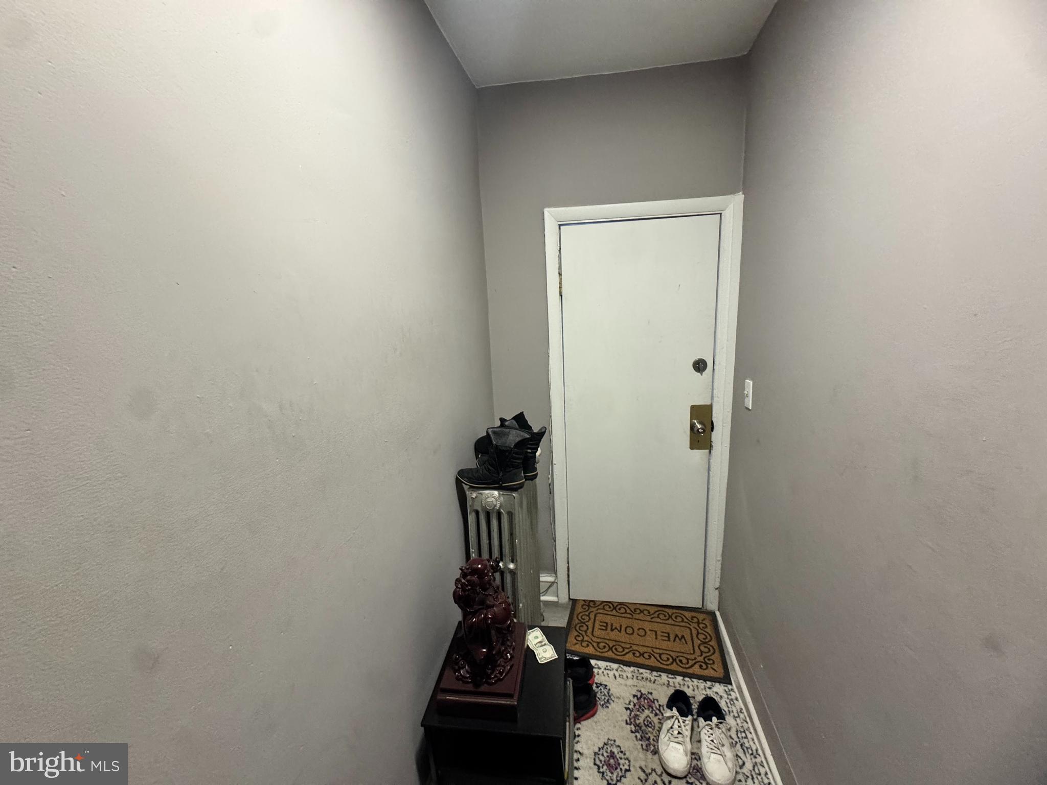 3322 Wellington Street Philadelphia, PA 19149 - Photo 17 of 18 a view of a livingroom with wooden floor and a sink