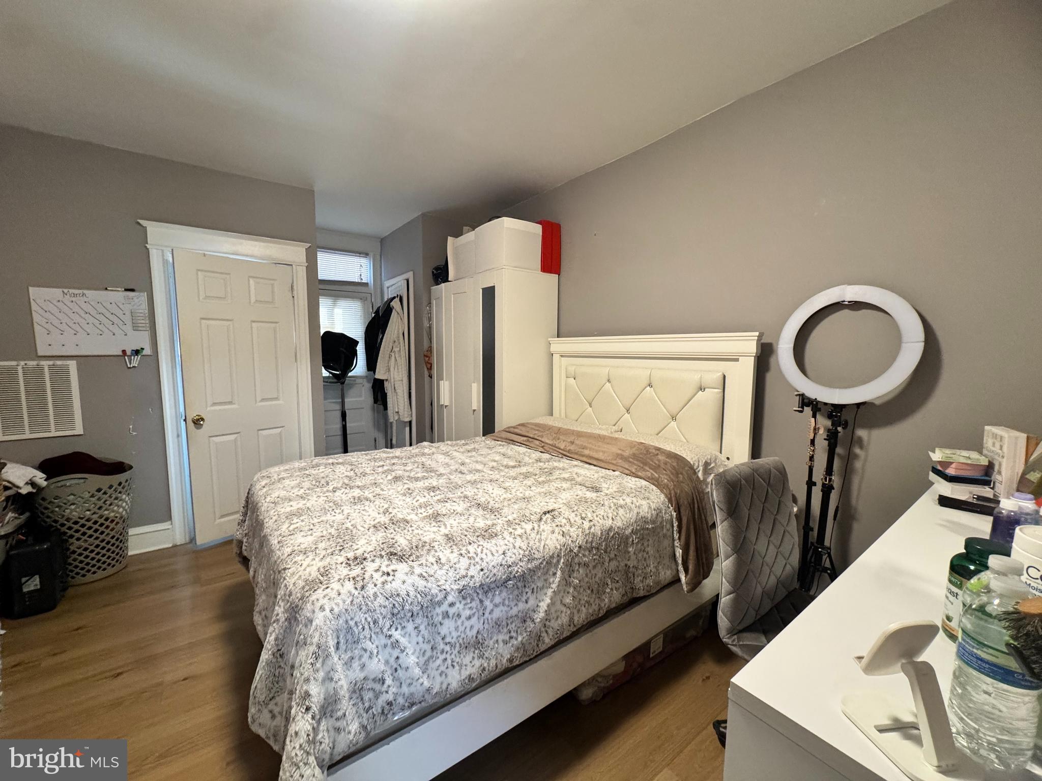 3322 Wellington Street Philadelphia, PA 19149 - Photo 7 of 18 a bedroom with bed and wooden floor
