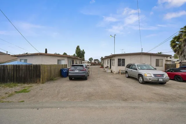 a car parked in front of a house