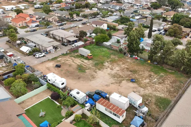 an aerial view of residential house with outdoor space
