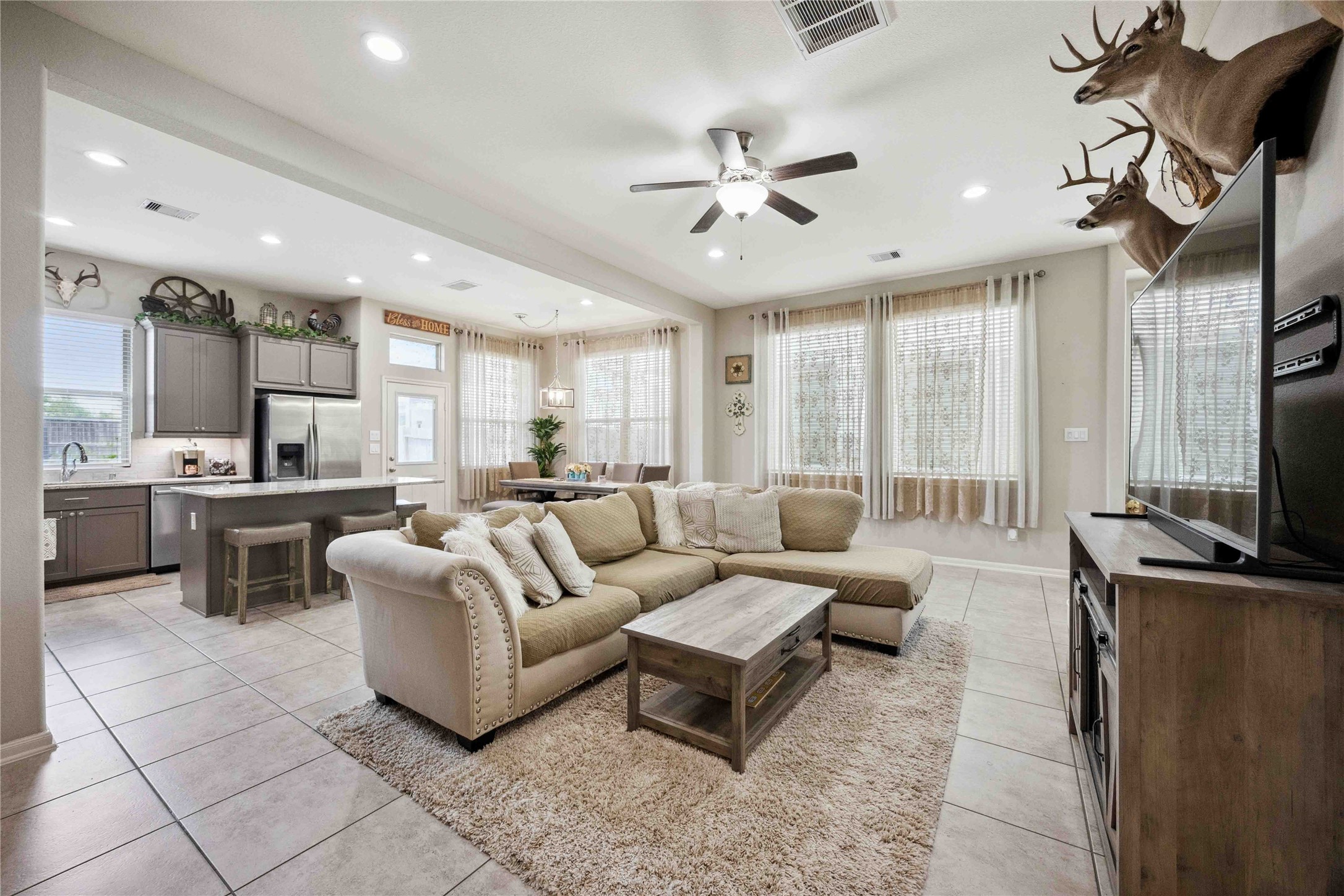 323 Biltmore Loop Montgomery, TX 77316 - Photo 7 of 27 The recessed lighting adds to a comfortable layout.