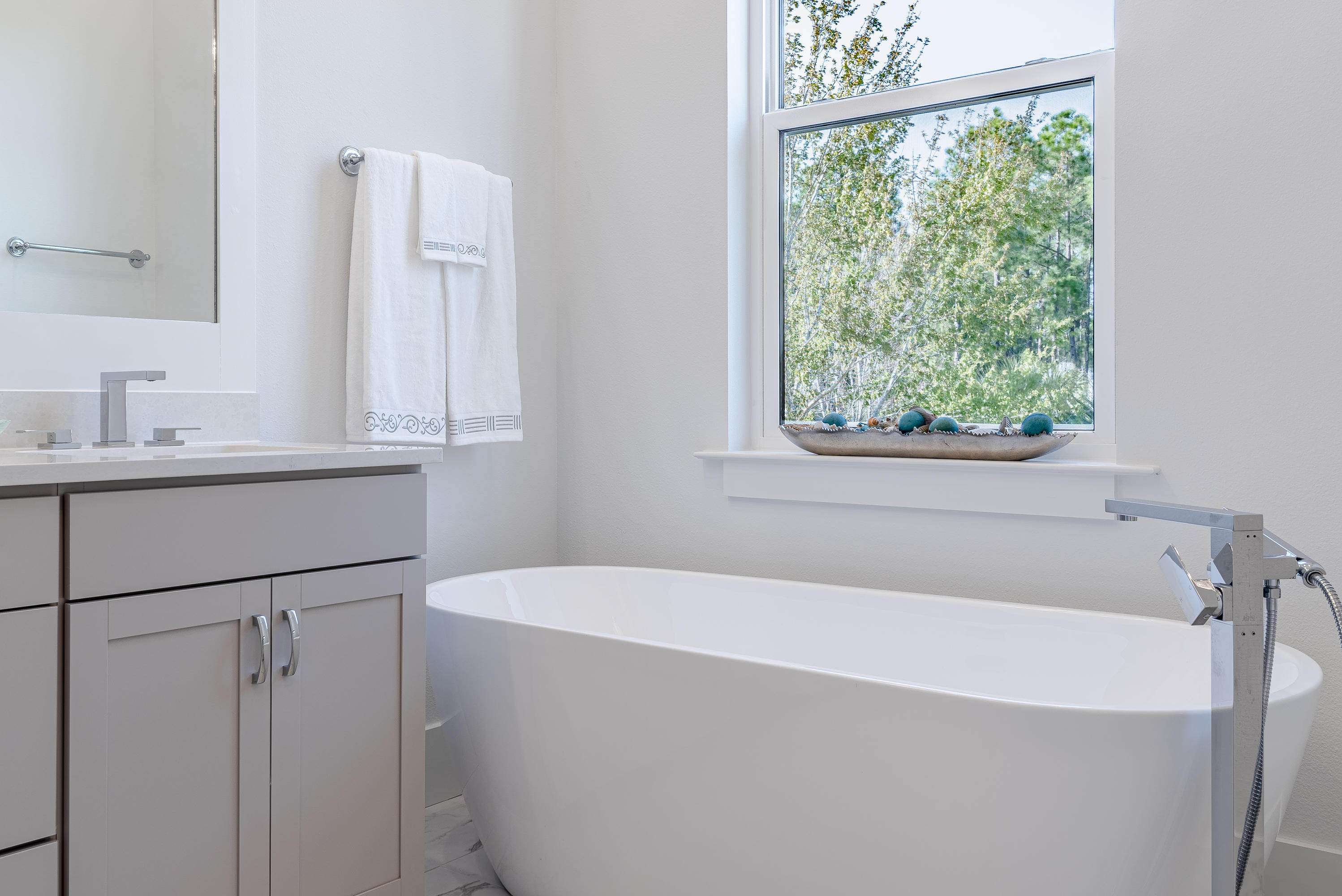 143 Marlberry Santa Rosa Beach Santa Rosa Beach, FL 32459 - Photo 34 of 53 a white bath tub sitting next to a window