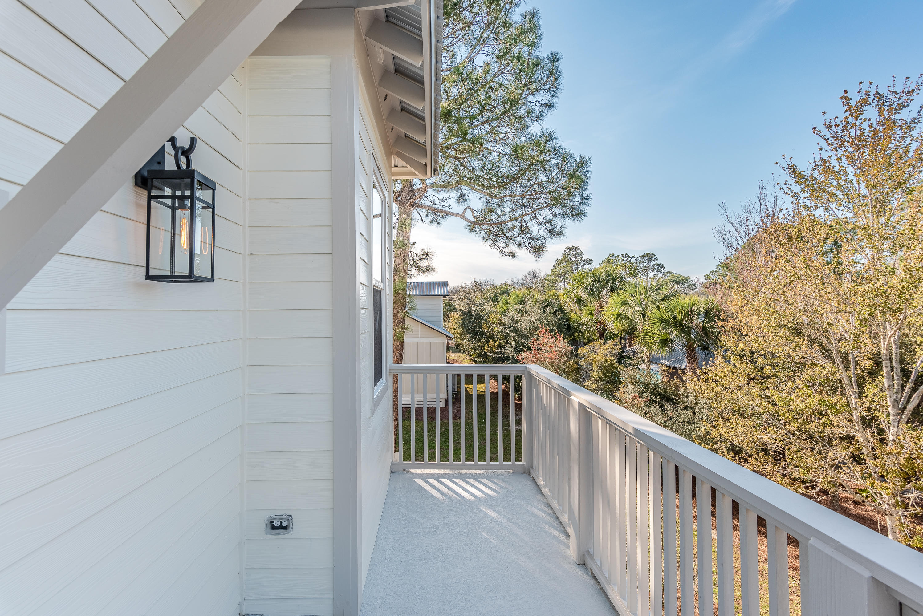 143 Marlberry Santa Rosa Beach Santa Rosa Beach, FL 32459 - Photo 38 of 53 a view of a balcony with wooden fence and floor