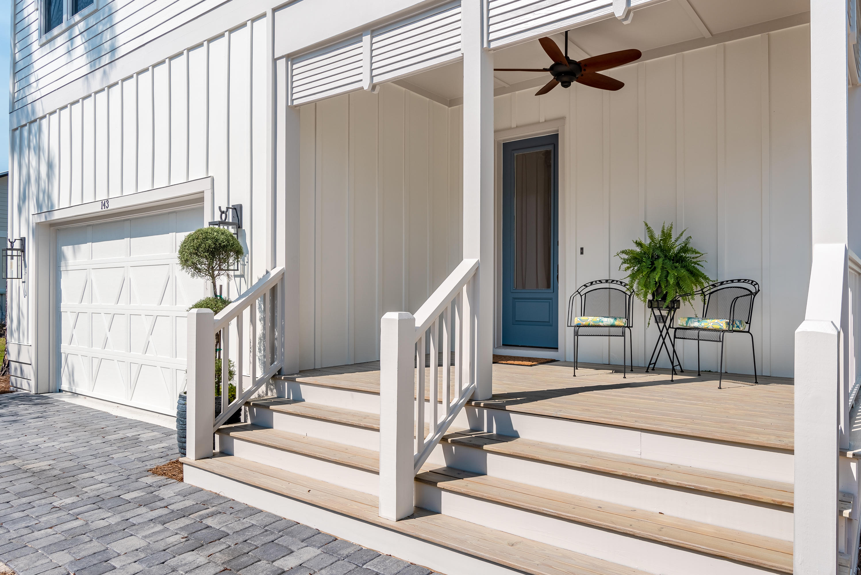 143 Marlberry Santa Rosa Beach Santa Rosa Beach, FL 32459 - Photo 4 of 53 a view of staircase with wooden floor and a potted plant