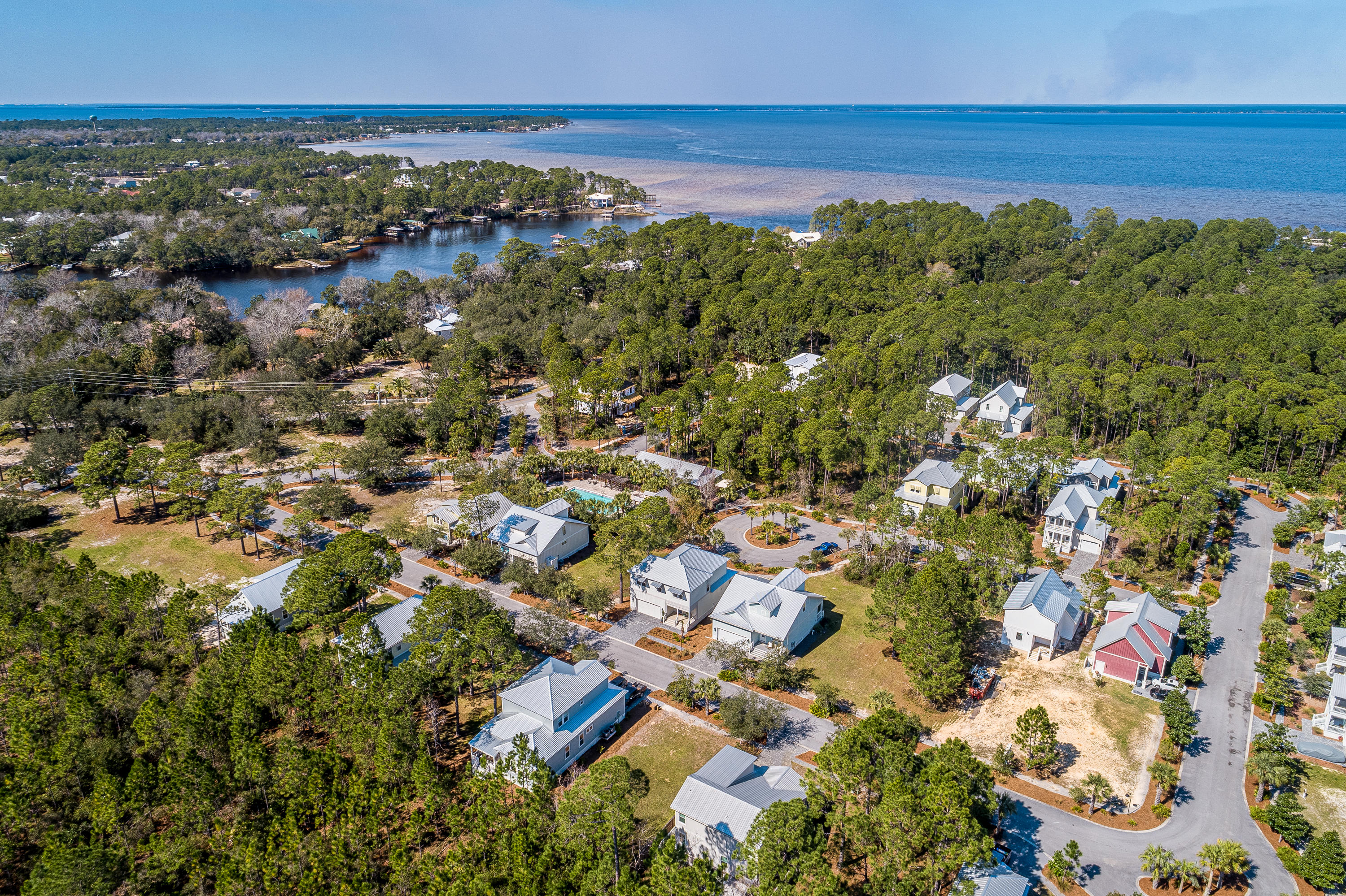 143 Marlberry Santa Rosa Beach Santa Rosa Beach, FL 32459 - Photo 47 of 53 an aerial view of residential houses with outdoor space and trees