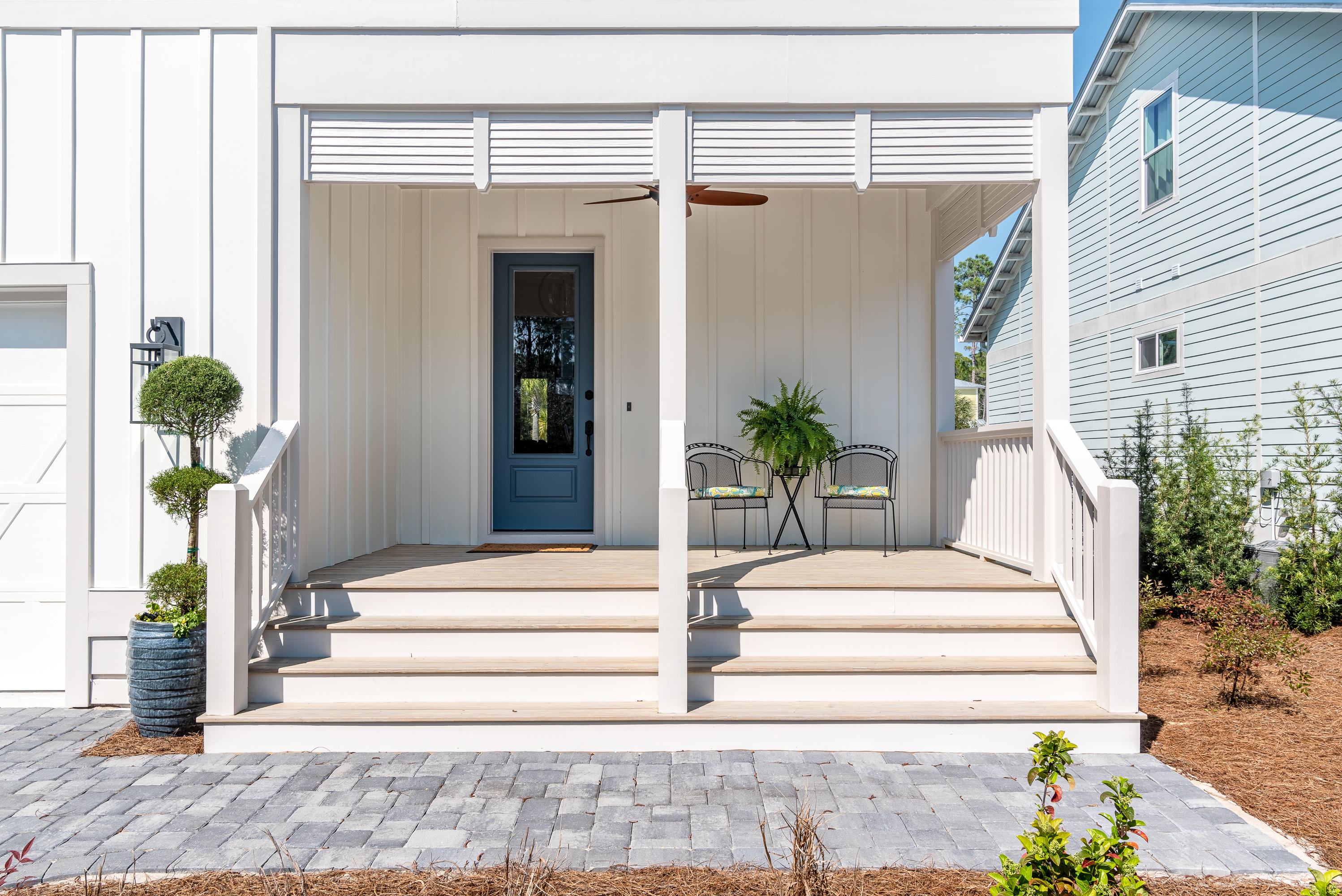 143 Marlberry Santa Rosa Beach Santa Rosa Beach, FL 32459 - Photo 5 of 53 a front view of a house with potted plants